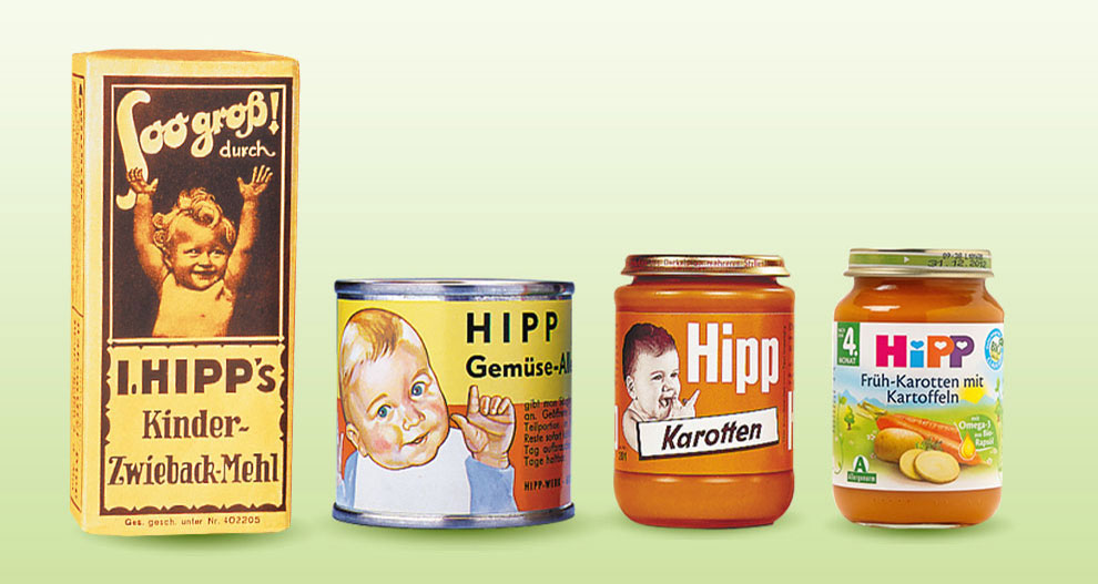 Four containers of baby food products with varying designs and labels, showcasing the evolution of packaging over time.